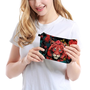 Portable cosmetic bag with red lion and floral print featuring high saturation colors