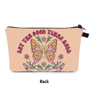 Close-up of butterfly printed canvas makeup bag with black zipper and vintage pattern