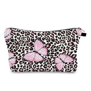 Detail of cute butterfly and pink leopard print makeup bag with durable black zipper