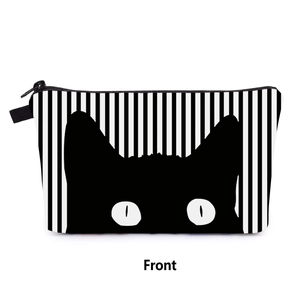 Front view of travel makeup bag featuring vertical stripes and a cute black cat print