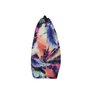 Detail of tropical palm leaf print and black zipper on textile travel cosmetic bag