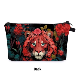 Detail view of the back of lion and rose printed travel toiletry bag with black zipper