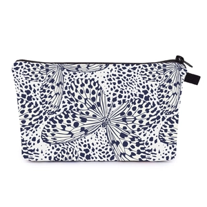 Detail shot of the durable zipper and butterfly pattern on the travel cosmetic bag