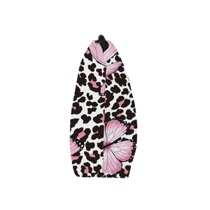 Detailed side view of butterfly leopard print cosmetic bag with black zipper closure