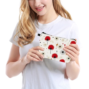Portable cream canvas makeup bag with abstract dandelion print and black zipper