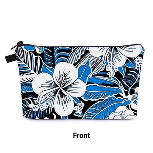 Front view of floral hibiscus print toiletry bag with black zipper and high contrast pattern