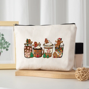Linen-style cosmetic bag with cute Christmas gingerbread and festive holiday patterns