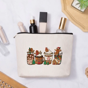 Linen makeup bag with cute Christmas gingerbread illustration on a marble background