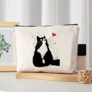 Beige faux linen cosmetic bag with cute cat illustration and smooth black zipper