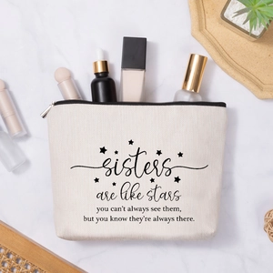 Linen style sister gift makeup bag with stars quote and cosmetic products inside