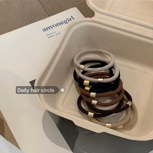 High elasticity hair ties set with matte gold metal beads in various earth tones
