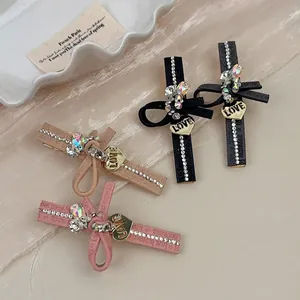 Élégante Pince à Cheveux Nœud en Cuir PU Strass Pendentif Cœur Barrette Bec de Canard Coiffe Douce pour Femmes Filles