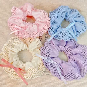 Lace scrunchie set with ribbon bows in pink, blue, beige, and purple for elegant hair styling