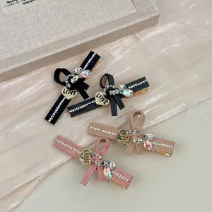Lot de barrettes à nœuds avec strass et breloques en forme de cœur pour femme
