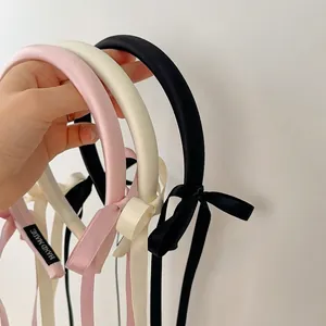 Elegant satin headband with ribbon bows in pink white and black handmade style