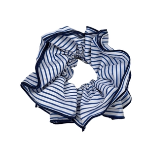 Blue and white striped scrunchie with navy blue edges for ponytails or buns