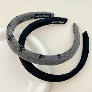 Chic black and grey bow print sponge headbands with a handmade label for women