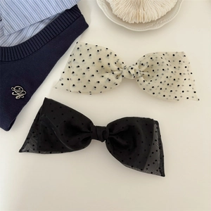 Vintage polka dot oversized bow hair clips in black and cream organza fabric for women