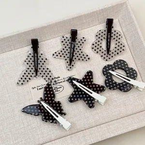 Set di 6 fermagli per capelli a pois bianchi e neri a forma di farfalla, stella e fiore