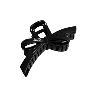 Pince à cheveux noeud noir brillant avec inscription Barrette La France élégante