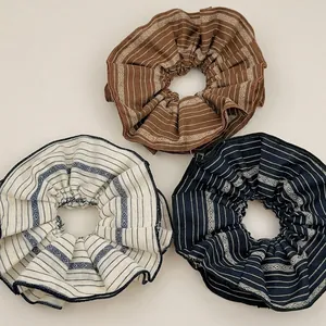 Three-piece set of retro striped fabric scrunchies with bohemian patterns and wavy edges