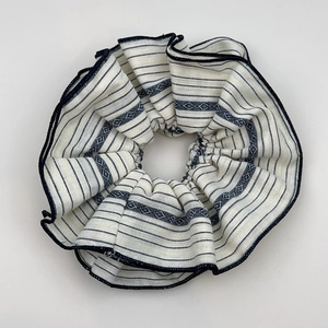 Blue and white striped retro fabric scrunchie with ethnic geometric patterns for women