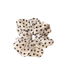 French style white scrunchie with black polka dots in elegant glossy satin material