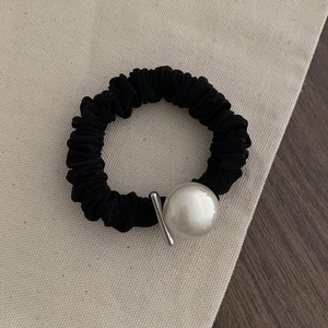 Elegant black scrunchie with large white pearl and silver metal bar accessory