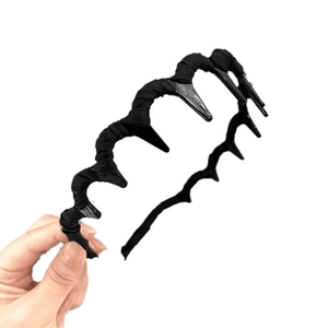 Wave-shaped black fabric-wrapped headband with non-slip teeth for high-crown styling