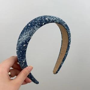 Deep blue denim headband with silver metal studs and comfortable sponge padding