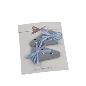 Lace bow hair clips with heart crystal for girls, set of two on display card