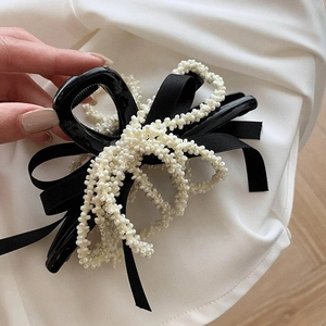 Elegant French style hair claw clip with black satin bow and hanging pearl tassel charms