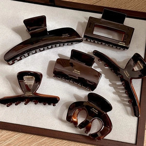 Set of 6 French acetate hair claws in dark tortoise shell finish for women's styling