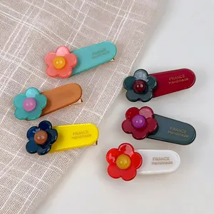 6-piece set of colorful acetate flower hair clips for women in vibrant candy colors