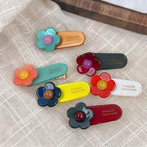 Set of 7 colorful floral acetate hair clips with France Handmade gold label