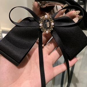 Elegant French black ribbon bow hair clip with vintage rhinestones and pearls