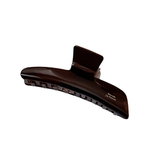 Glossy dark acetate claw clip featuring Borrette La France logo on white background