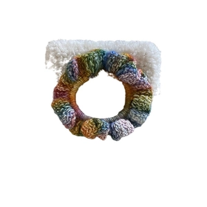 Handmade rainbow crochet hair clip with cute white plush heart and star decorations