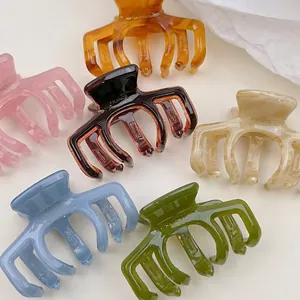 Set of 6 jelly color acetate hair claws in various marble and tortoiseshell patterns