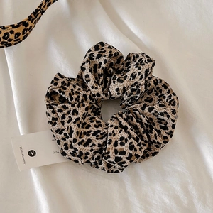 Vintage leopard print scrunchie hair tie made of elastic chiffon fabric for women