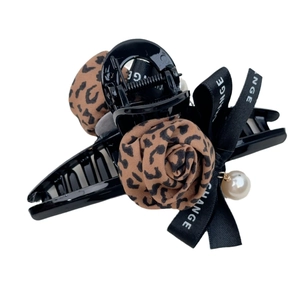 Elegant leopard print bow hair claw clip with black ribbon and pearl pendant charm