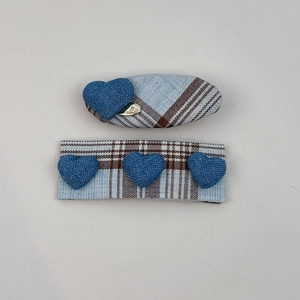 Detail of blue plaid heart hair clips set including oval and rectangular hairpins