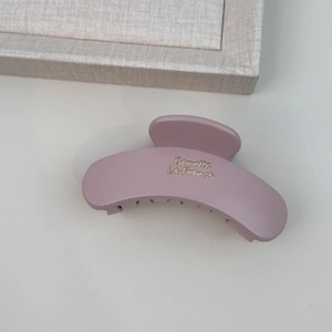 Matte mauve cloud hair claw clip with golden French lettering for thick hair styling