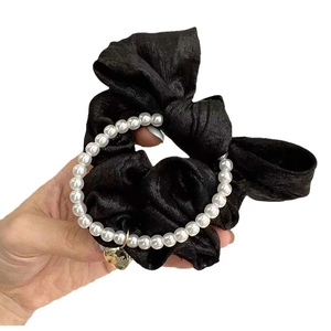 French vintage black silk scrunchie with white pearls and a gold heart pendant