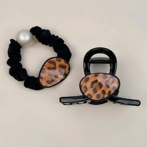 Leopard print hair claw clip and black scrunchie set with pearl detail for women