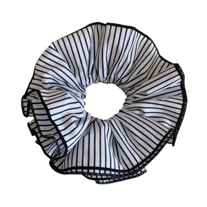 Classic black and white striped oversized scrunchie with fine pleated fabric texture