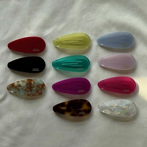 Lot de 11 barrettes gouttes en acétate coloré avec inscription France Handmade dessus