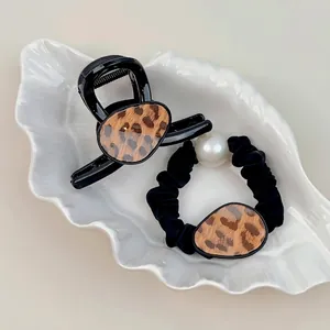 Leopard print hair claw clip and black scrunchie set with white pearl detail