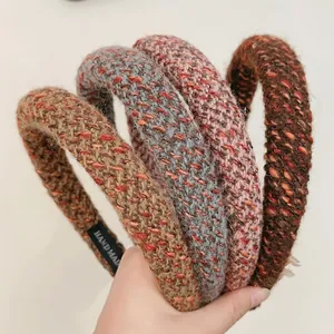 Elegant knit headband set in warm autumn colors with handmade texture and metallic thread