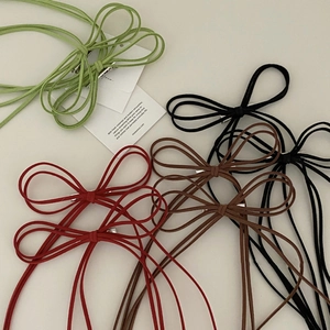 Elegant multi-loop faux suede bow hair clips in green, black, red, and brown colors